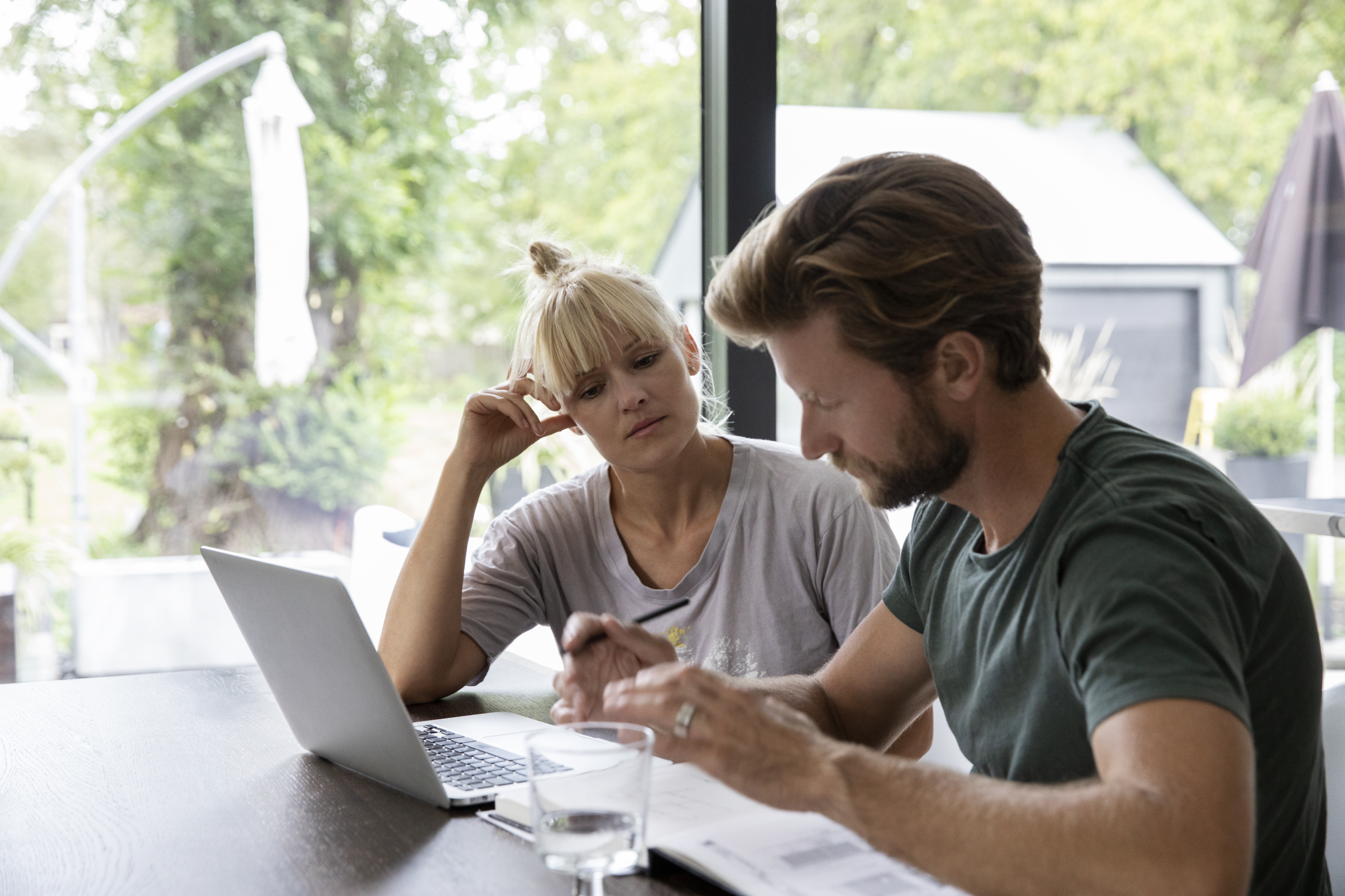 Couple reviewing portfolio documents